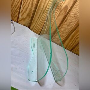 Clear acrylic surfboard wall mount for display